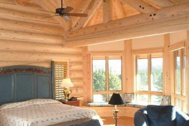 Large mountain style guest bedroom photo in Boise with no fireplace