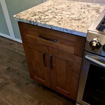 Dura Supreme Cabinets Knotty Alder Butternut Romanix Granite Galley Kitchen
