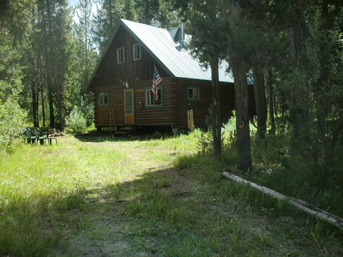 We need ideas for the exterior of this humble cabin.