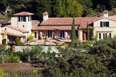 Example of a tuscan home design design in San Francisco
