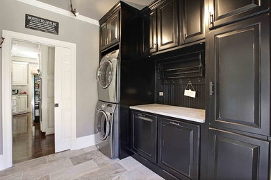 Elegant gray floor laundry room photo in Atlanta