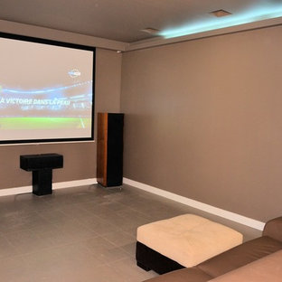 Example of a mid-sized trendy enclosed ceramic floor home theater design in Saint-Etienne with brown walls and a projector screen