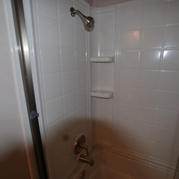 Fiberglass 4 piece combo tub/shower with Brushed Nickel Fixtures