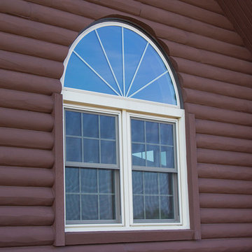 Valders log home with Soft-Lite Windows