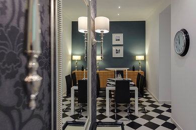 Inspiration for a mid-sized contemporary black floor kitchen/dining room combo remodel with gray walls