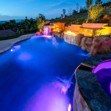 Pool with slide, water fall and fire feature!