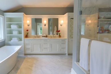 Mid-sized transitional master white tile and marble tile marble floor and white floor bathroom photo in New York with shaker cabinets, white cabinets, gray walls, an undermount sink and quartz countertops