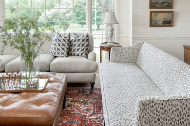 Inspiration for a mid-sized transitional living room remodel in Milwaukee with white walls