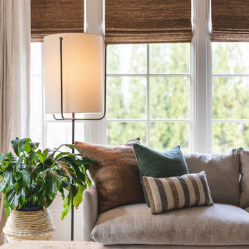Layered Neutral Family Room with Architectural Beams