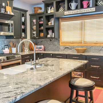 Silver Cloud granite kitchen with full height backsplash