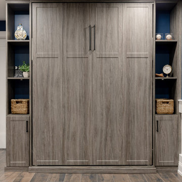 Room with Integrated Murphy Bed and Grey Wood Grain Cabinetry