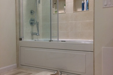 Bathroom - small contemporary 3/4 porcelain tile and beige floor bathroom idea in Boston with white walls