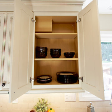 Waypoint Cream Cabinets with Beige Backsplash