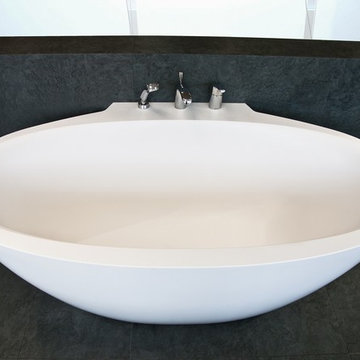 Aquatica Sensuality™ Mini-Wall Back To Wall Solid Surface Bathtub