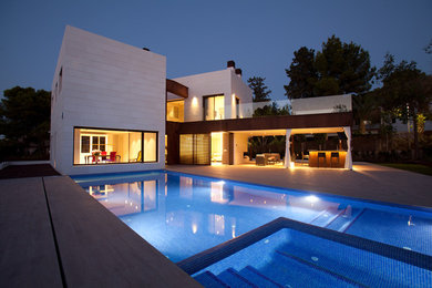 This is an example of a large contemporary home design in Other.
