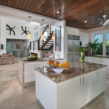Contemporary kitchen and dining room in a luxury contemporary St. Thomas vacatio