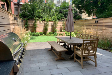 Patio - contemporary backyard patio idea in New York