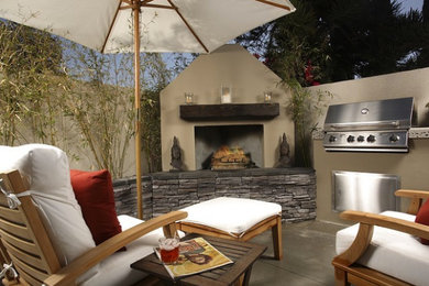 Patio - mid-sized traditional backyard concrete patio idea in Houston with a fire pit and no cover
