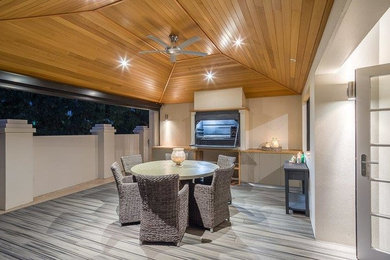 Contemporary backyard deck in Perth with no cover.