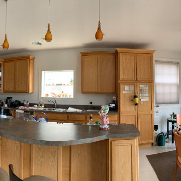 Handle-less european style kitchen in suburban Long Island, NY