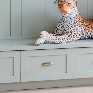 Custom Playroom Built-In Cabinets with TV Wall and Bench Storage