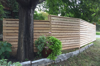 Photo of a mid-sized modern courtyard landscaping in Ottawa.