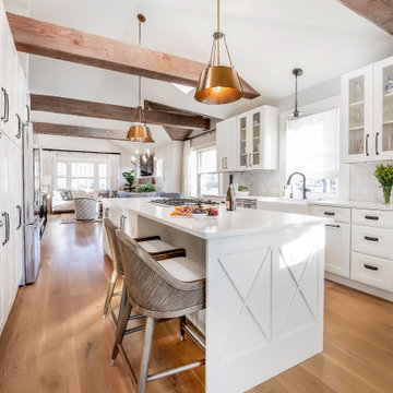 White kitchen with wood beams