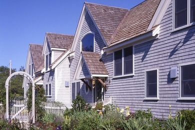Example of a gray two-story exterior home design in Boston