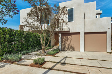 Single front door - large single front door idea in Los Angeles with gray walls and a light wood front door