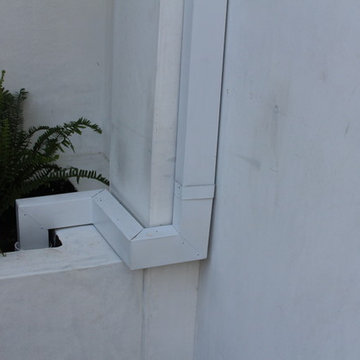 6 inch Angle Face/Flat Face Gutters with smooth Downspouts in Pacific Palisades