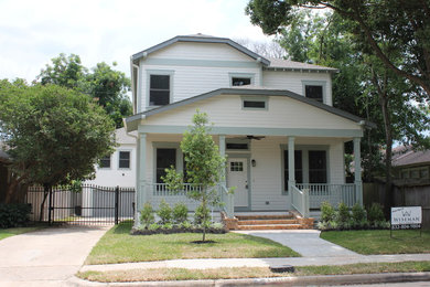 Large craftsman white two-story concrete fiberboard exterior home idea in Houston