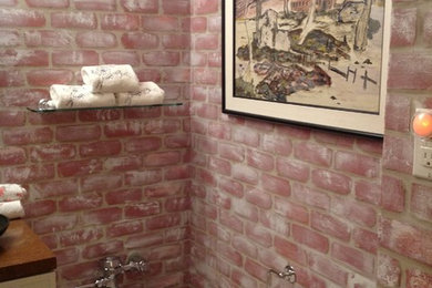 Example of an eclectic powder room design in New York
