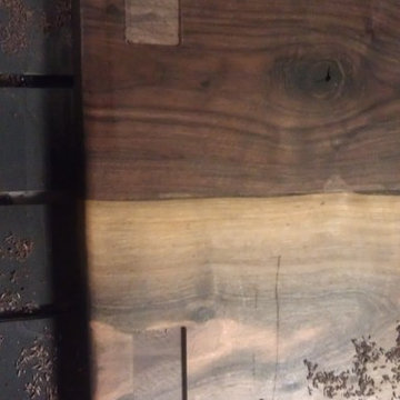Live edge walnut slab tables with inlays and engravings
