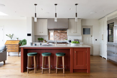 Design ideas for a large modern eat-in kitchen in Surrey.