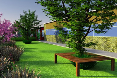 Design ideas for a large contemporary front yard full sun xeriscape for spring in Other with with outdoor playset and decking.