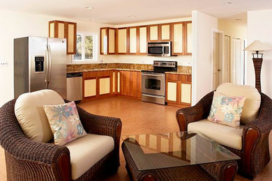Mid-sized elegant l-shaped bamboo floor open concept kitchen photo in Hawaii with an undermount sink, shaker cabinets, granite countertops, stainless steel appliances, multicolored backsplash, no island and light wood cabinets