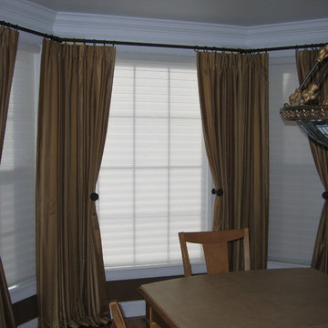 Pleated Draperies on Wrought Iron Rods, over Silhouette Shades for Bay Window