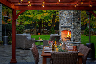 Make a Statement with a Versatile Outdoor Kitchen and Double Fire Feature