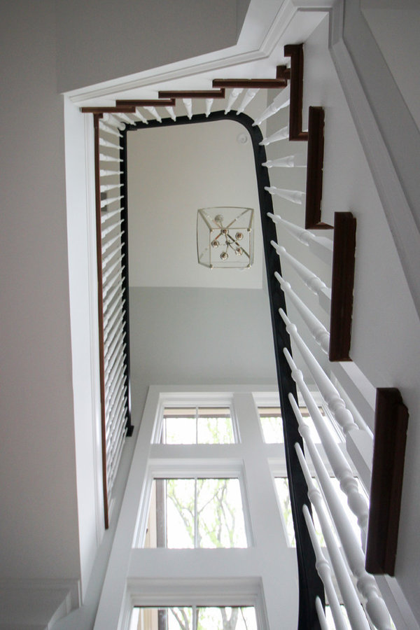 Powerful Impression by Floating Staircase in Suburban Foyer