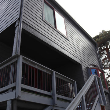 Dark Exterior Remodel | James Hardie Siding with Stone Accents