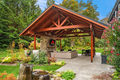 Patio - mid-sized modern side yard concrete paver patio idea in Seattle with a bbq area and a gazebo