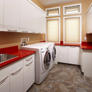 Photo of a modern utility room in Other with red worktops.