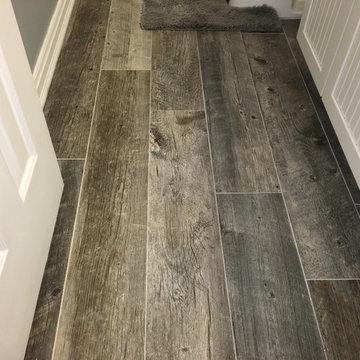 Bathtub replaced and new tile, vanity, floor.