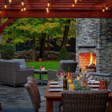 Make a Statement with a Versatile Outdoor Kitchen and Double Fire Feature