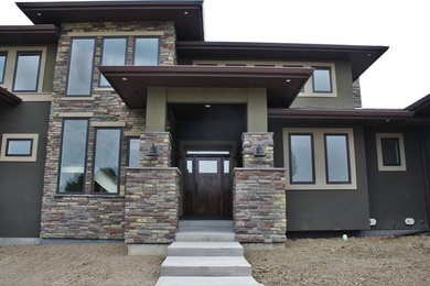 Example of a trendy home design design in Denver