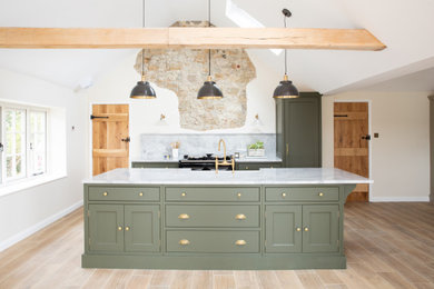 Example of a mid-sized classic kitchen design in Sussex