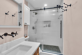 Urban Chic Oasis: Transforming Small Bathroom in Columbia Heights