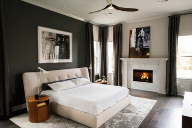 Bedroom - transitional master dark wood floor bedroom idea in Little Rock with gray walls, a standard fireplace and a stone fireplace
