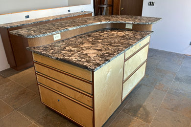 Example of a mid-sized trendy kitchen design in Seattle with an island