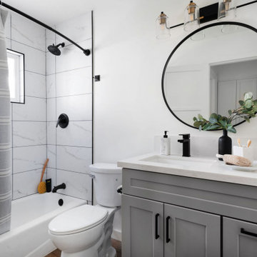 Gray Bath Vanity and Gray Striped Shower Curtain
